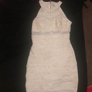 White sparkly dress. Tight fit, size is small.